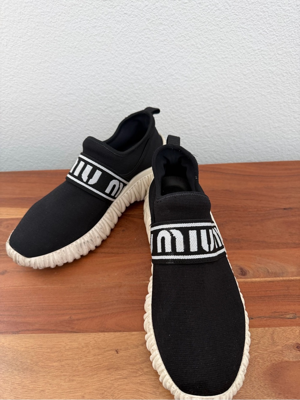 Miu Miu Black Slip On Logo Sneakers
Size 8.5